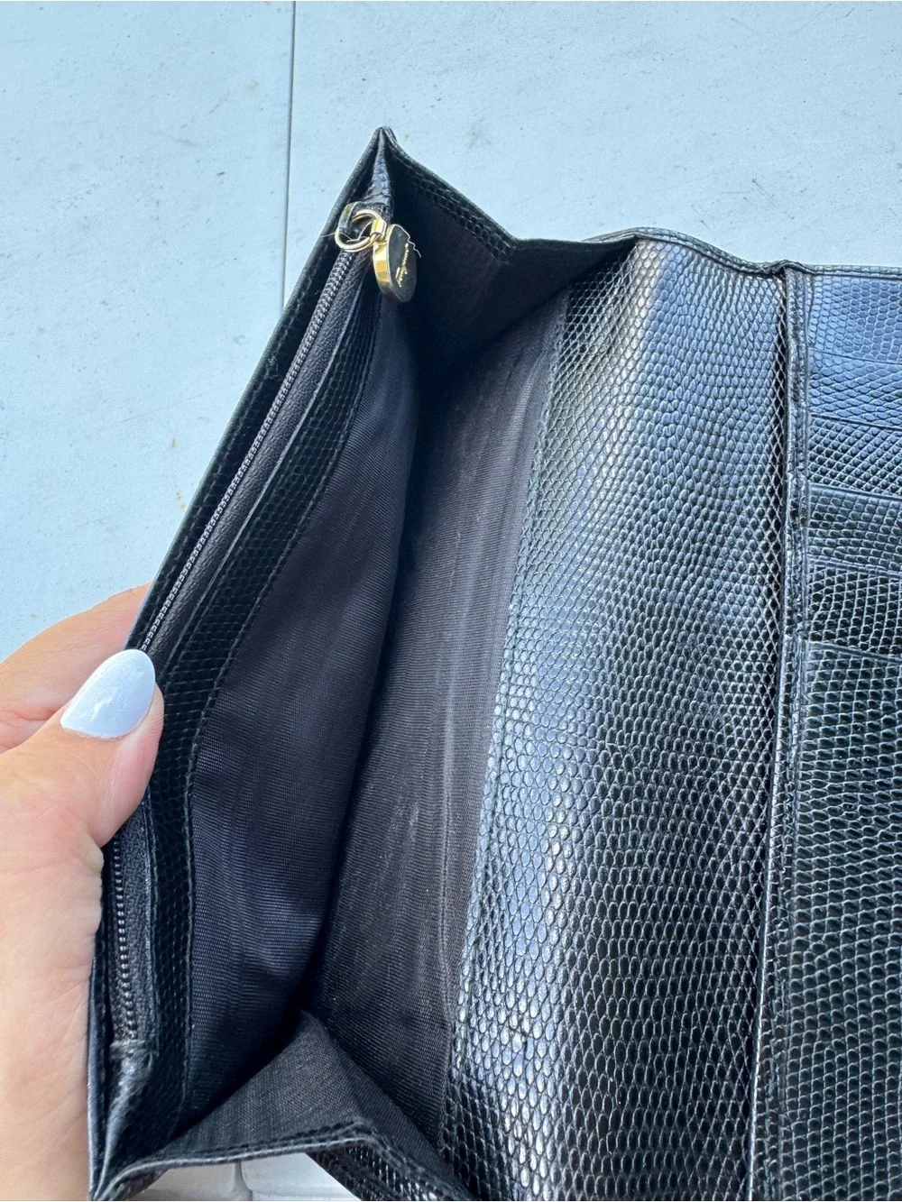 Salvatore Ferragamo Black Leather Clutch with Gold Vara Buckle